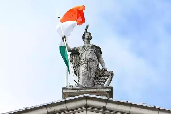 Irish flag and statue